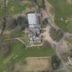 Oblique aerial view centred on the country house (hotel),  taken from the SE.