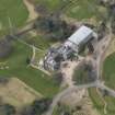 Oblique aerial view centred on the country house (hotel),  taken from the E.