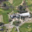 Oblique aerial view centred on the country house (hotel),  taken from the NE.