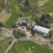 Oblique aerial view centred on the country house (hotel),  taken from the N.