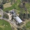 Oblique aerial view centred on the country house (hotel),  taken from the NNW.