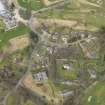 Oblique aerial view centred on the stables with the country house (hotel) adjacent,  taken from the SSE.