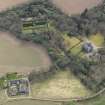 Oblique aerial view centred on the country house with the walled garden adjacent, taken from the NNW.