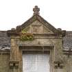Detail of dormer with carved thistle motif in the pediment and finial on  on E side of front elevation.