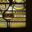 Interior. Stained glass window, detail of manufacturer's name W. & J.J. Kier, Glasgow