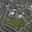 Oblique aerial view centred on the school, taken from the NW.