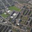 Oblique aerial view centred on the school, taken from the ESE.