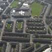 Oblique aerial view centred on the Shawlands District with the school adjacent, taken from the NE.
