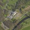 Oblique aerial view centred on the house, taken from the WSW.