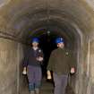 Interior, within access tunnel, Mr Allan Kilpatrick (RCAHMS) and Mr Matt Ritchie (Forestry Commission) exitiing.