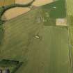 General oblique aerial view centred on the remains of the radar station, taken from the ESE.