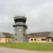 View from SW of control tower with associated buildings.