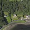 Oblique aerial view centred on the house, taken from the E.