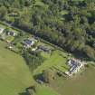 General oblique aerial view centred on the kennels, taken from the SW.