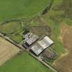 Oblique aerial view centred on the farmsteading, taken from the NW.