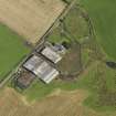 Oblique aerial view centred on the farmsteading, taken from the SW.