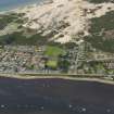 General oblique aerial view centred on the S part of the village, taken from the SW.