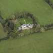 Oblique aerial view centred on the house, taken from the SW.