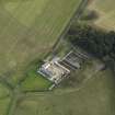 Oblique aerial view centred on the farmstead, taken from the NW.