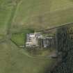 Oblique aerial view centred on the farmstead, taken from the WSW.