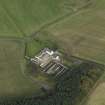 Oblique aerial view centred on the farmstead, taken from the SW.