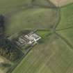 Oblique aerial view centred on the farmstead, taken from the SE.