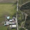 Oblique aerial view centred on the farmstead, taken from the NNW.