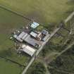 Oblique aerial view centred on the farmstead, taken from the NW.