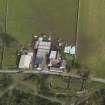 Oblique aerial view centred on the farmstead, taken from the WSW.