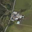 Oblique aerial view centred on the farmstead, taken from the ESE.