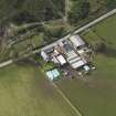 Oblique aerial view centred on the farmstead, taken from the SE.