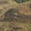 Oblique aerial view centred on Muclich Hill, taken from the W.