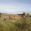 View from SW of derelict buildings.