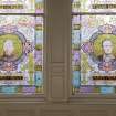 Interior. W staircase, stained glass window, detail of benefactors, James Inglis and James Deans