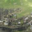 Oblique aerial view centred on the bridge with the village adjacent, taken from the SSW.