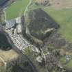 Oblique aerial view centred part of the village and caravan park, taken from the E.