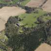 General oblique aerial view centred on the country house, taken from the NW.