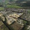 General oblique aerial view centred on the town of Banchory, taken from the NW.