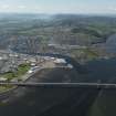 Oblique aerial view of the Kessock Bridge, the Citadel area of Inverness and the Longman Industrial Estate with Loch Ness beyond, taken from the NE.