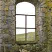Interior.View of the south east facing window within the south west jamb of the church