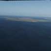 General oblique aerial view centered on Westray in the distance, taken from the SW.