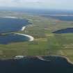 General oblique aerial view of the S end of Westray with Papa Westray to the NE, taken from the SE.