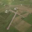 Oblique aerial view centred on North Ronaldsay airfield, taken from the W.