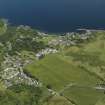 General oblique aerial view  of Carradale, taken from the SW.