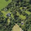 Oblique aerial view centred on Carradale Country House, taken from the NE.