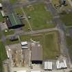 Oblique aerial view centred on the technical area with part of the fabrication yard, taken from the NNW.