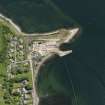 Oblique aerial view centred on the remains of the shipyard, taken from the W.