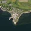 Oblique aerial view centred on the remains of the shipyard, taken from the S.