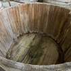 Interior.  Detail of wooden vat with metal lining removed in VAT house