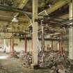 Interior. General view of main hall in phosphorus charging house showing part of the conveyor belt system.